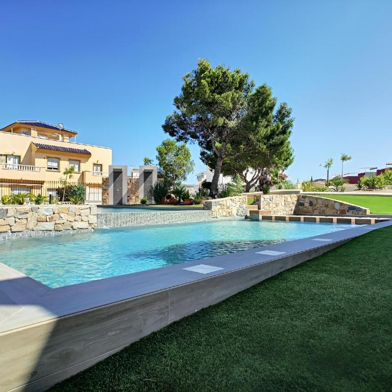 Balcon de la Laguna, Ground floor apt, stunning garden, pools - By OYOOSTAYS - Apartment - Ground Floor - 1