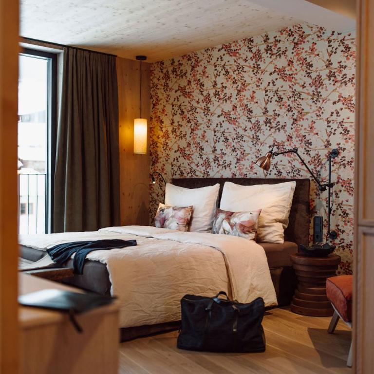 Boutique Hotel Das Rivus - Junior Suite mit Poolblick - 2