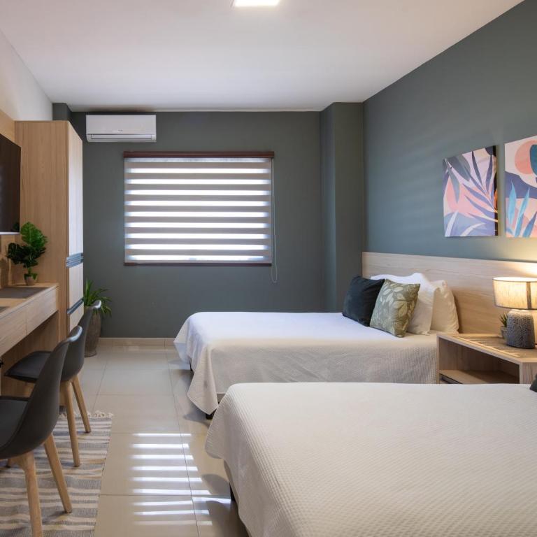 Equipetrol Suites apart hotel - Habitación Doble Estándar con 2 camas dobles - 3