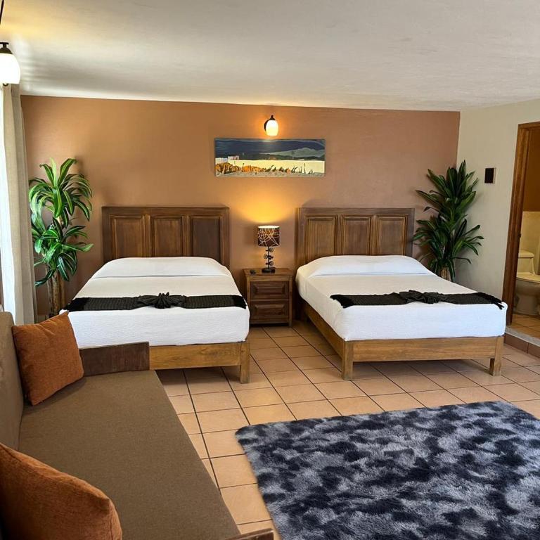 Hotel Jardín del Cantador - Quadruple Room - 4