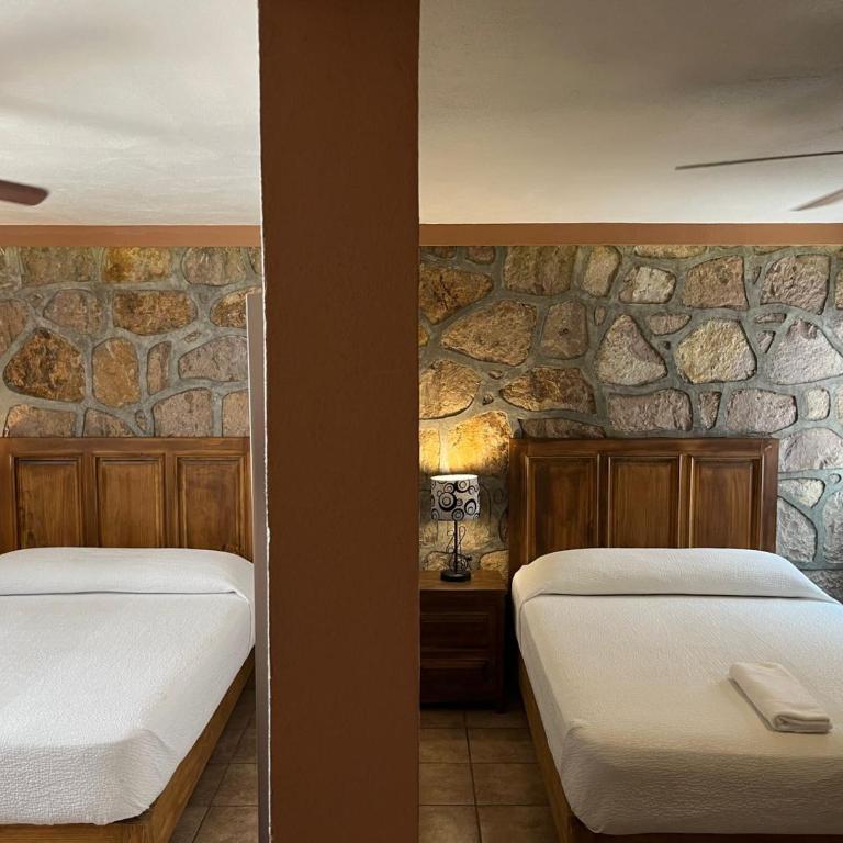 Hotel Jardín del Cantador - Quadruple Room - 8