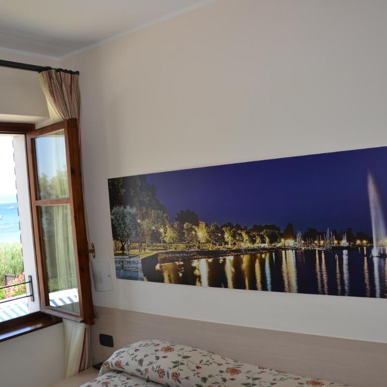 Locanda Le Palafitte - Camera Matrimoniale/Doppia con Letti Singoli con Vista Lago. - 4