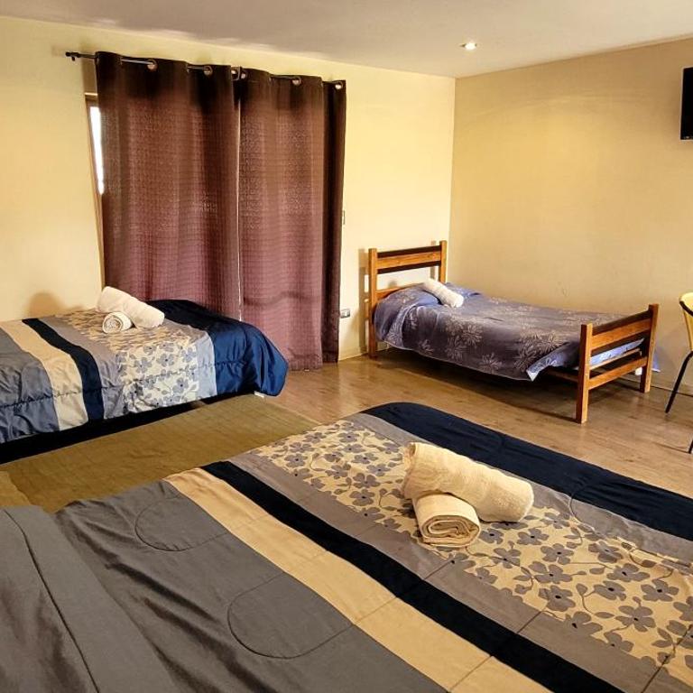 Habitaciones Tahiken - Habitación Familiar con balcón - 3