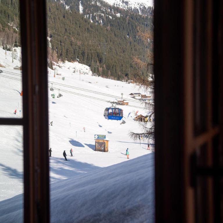 Chalet Marmotta CULM - Luxus Chalet Ski-In Ski-Out - Penthouse-Apartment - 22