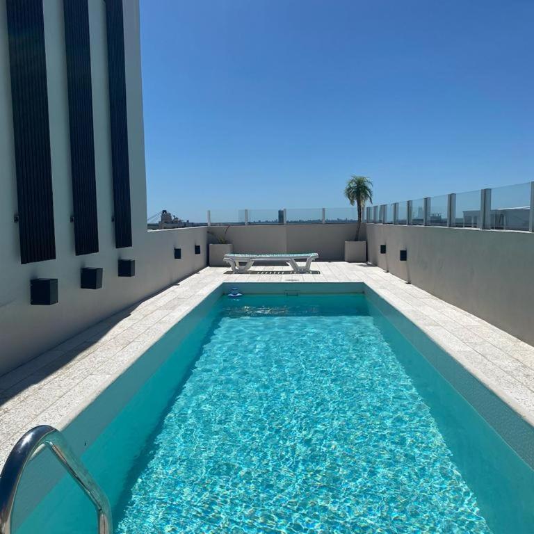 DEPARTAMENTO CENTRICO DE LUJO CON PISCINA Y COCHERA - Two-Bedroom Apartment - 1
