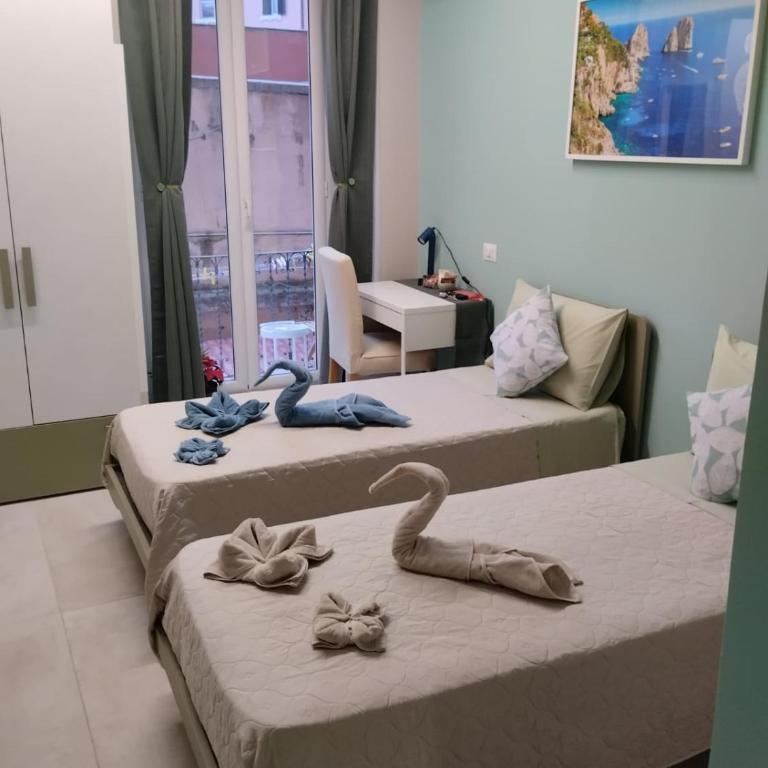 B&B LE TRE ISOLE - Camera Matrimoniale/Doppia con Letti Singoli con Bagno in Comune - 1