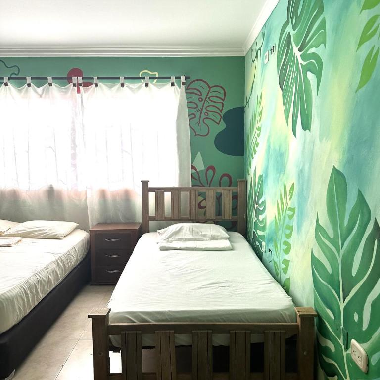 Hostal Casa Macondo - Triple Room with Private Bathroom - 9