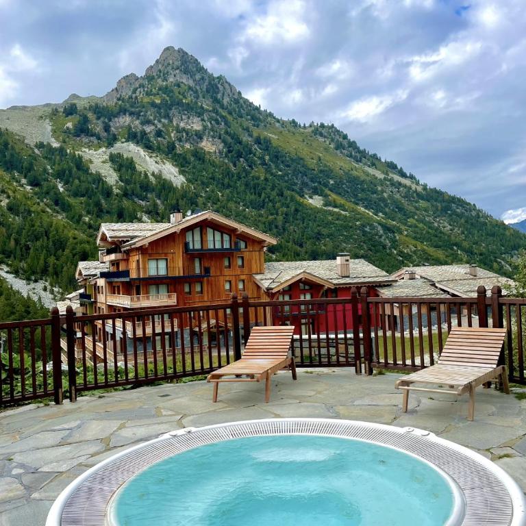 Appartement T3 ARC 1950 skis aux pieds Sauna, Hammam, Jacuzzi - Appartement 2 Chambres - 24