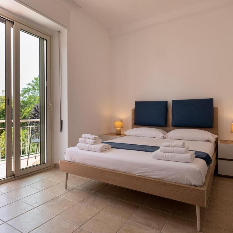Nautika Suites - Camera Matrimoniale Superior con Balcone - 8