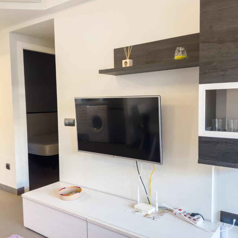 Apartamento con jardín en primera linea de playa con parking y piscina - Apartamento - Planta baja - 7
