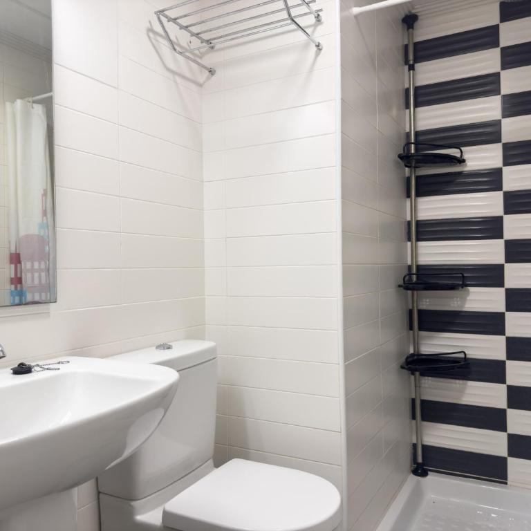 Apartamento con jardín en primera linea de playa con parking y piscina - Apartamento - Planta baja - 15