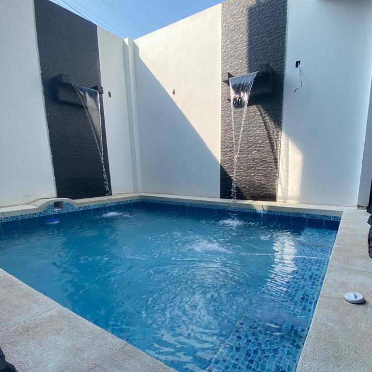 Casa de Lujo con Piscina privada Flandes Tolima - Three-Bedroom House - 15