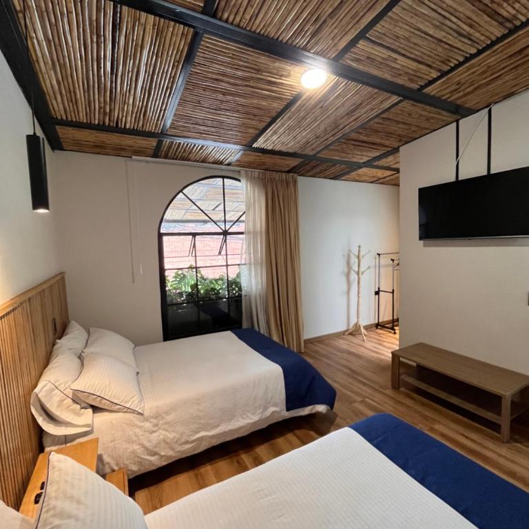 Casa 121, calle 121 no 7-18 - Habitación Doble - 2 camas - 14