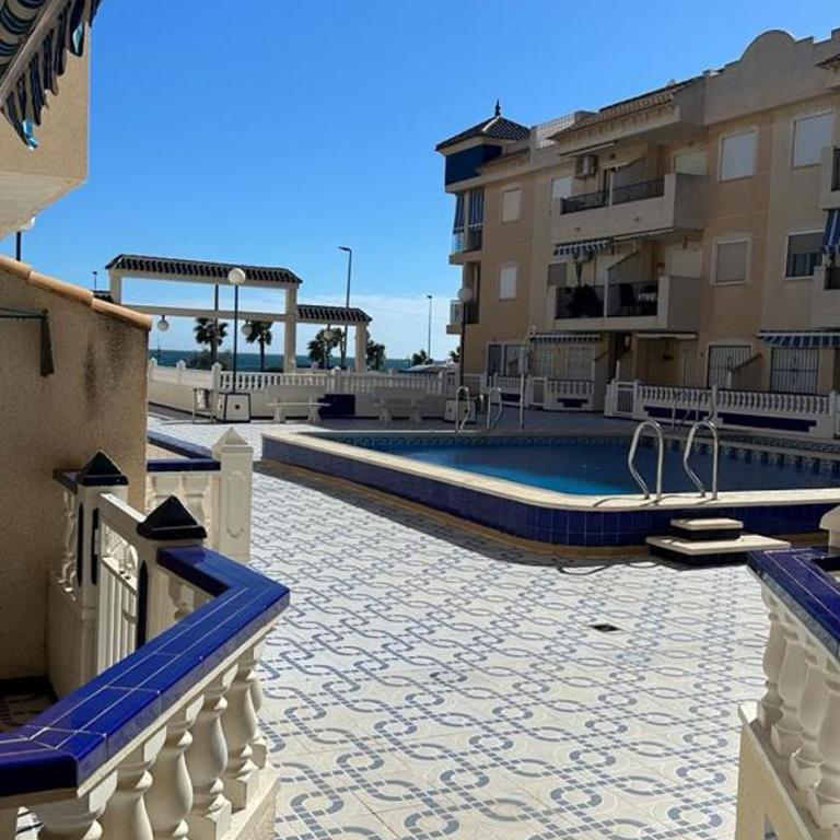 Playa de Los Naufragos Cozy Apartment with Pool - One-Bedroom Apartment - 14