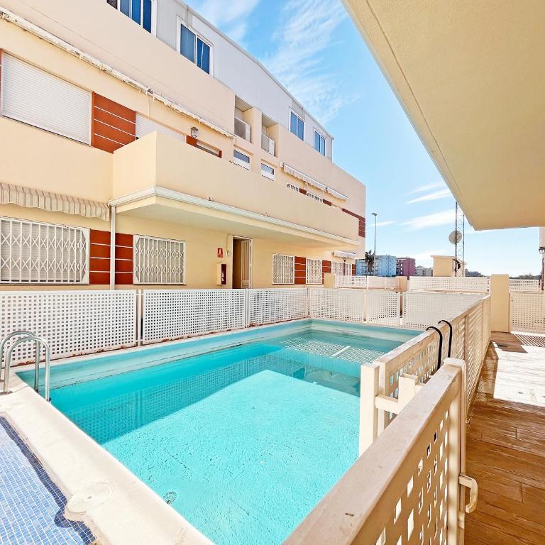 Global Vacacional, Práctico apartamento con piscina en la playa de Canet - Apartment - Erdgeschoss - 1
