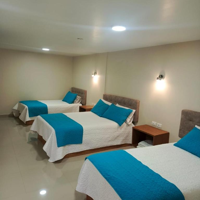 Hostal Plaza by Elvita - Habitación Doble Deluxe - 2 camas dobles - 11