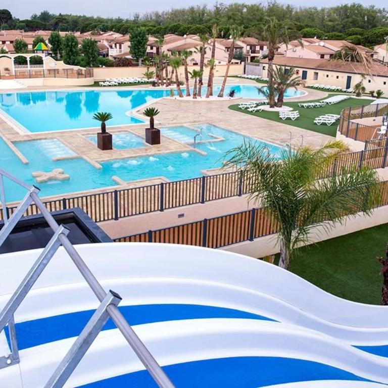 Villa d'angle spacieuse climatisée étage, clôturée dans domaine PORTES DU SOLEIL, 3 chambres, 7 couchages, wifi, accès payant aux piscines, 400m de la mer de portiragnes plage,LRPDSR6 - Casa de 3 dormitorios - 17