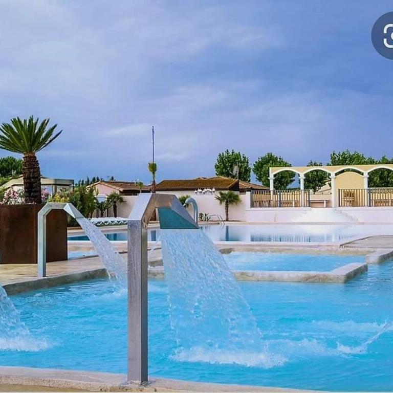 Villa d'angle spacieuse climatisée étage, clôturée dans domaine PORTES DU SOLEIL, 3 chambres, 7 couchages, wifi, accès payant aux piscines, 400m de la mer de portiragnes plage,LRPDSR6 - Casa de 3 dormitorios - 21