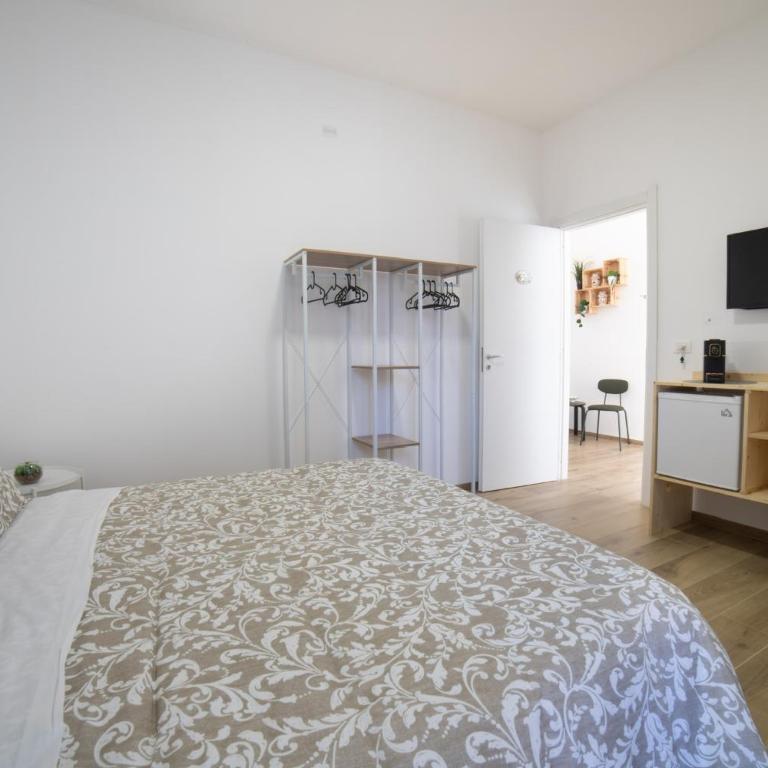 Residence Le Tre Piazze - Camera Deluxe (2 Adulti + 1 Bambino) - 10