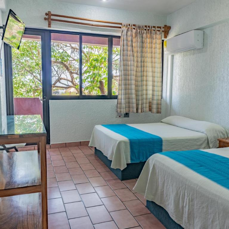 Hotel El Mirador - Habitación Doble con balcón - 2 camas - 7