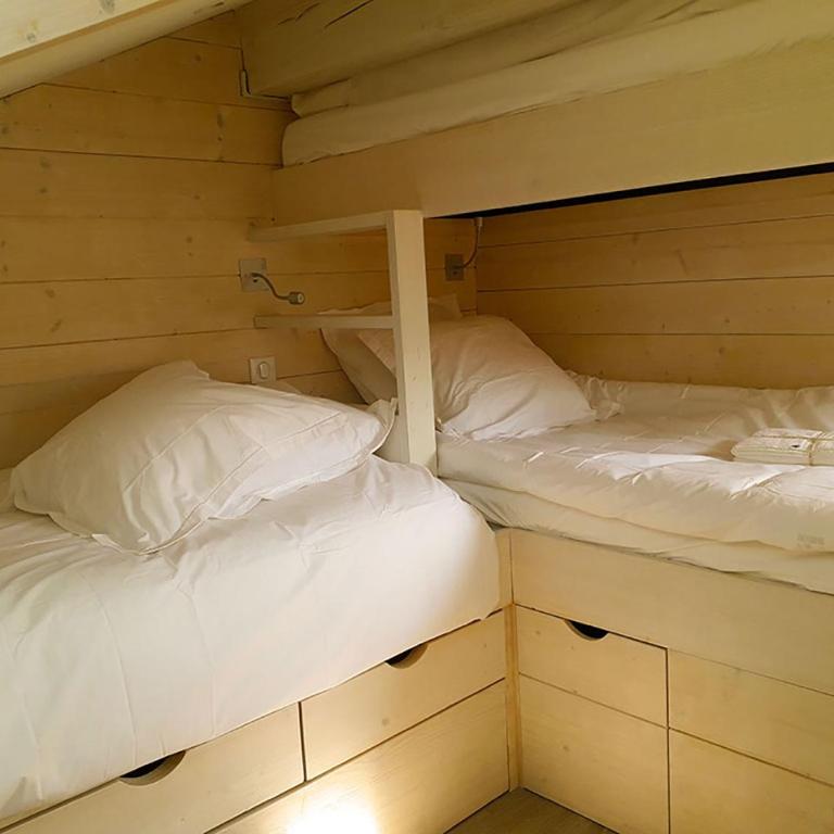 Duplex skis aux pieds centre village - 6 couchages - 2 salles de bain - Appartement 2 Chambres - 18