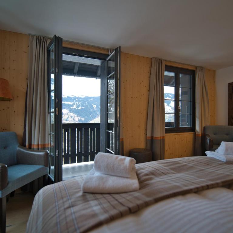 Eiger View Alpine Lodge - Doppelzimmer Deluxe mit Balkon und Eigerblick - 9