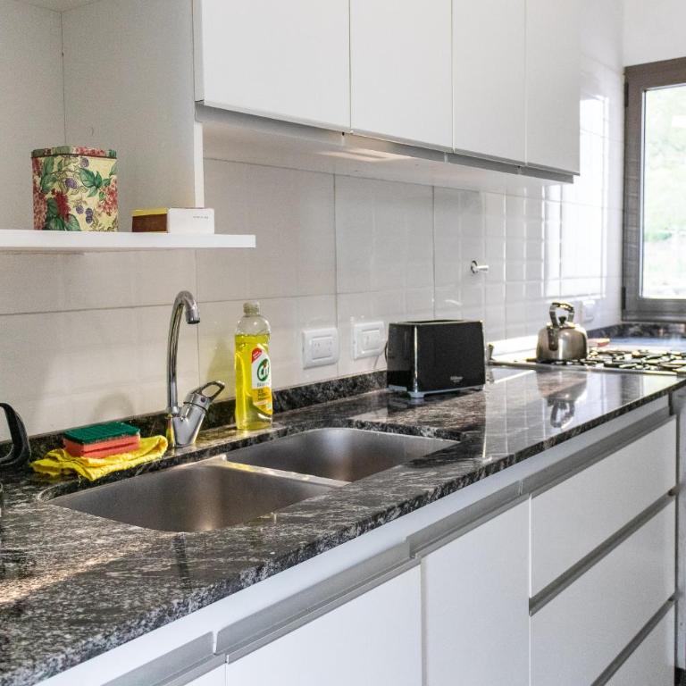 Casa con vista plena al lago y a la ciudad de Villa Carlos Paz IG alquilervillacarlospaz - Casa Unifamiliar de 3 dormitorios - 22