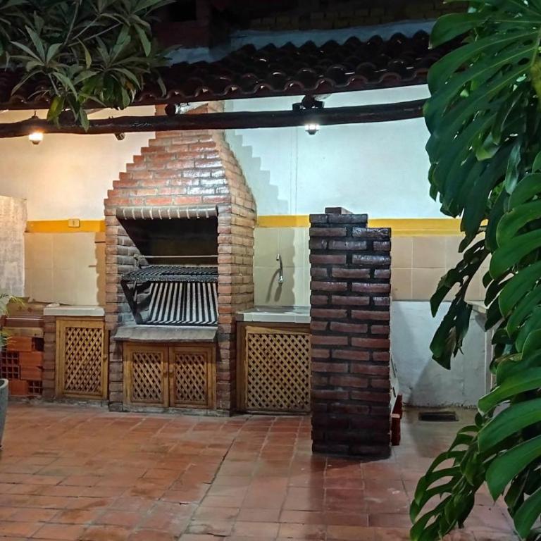 Céntrico Monoambiente con Parrillero Privado - Estudio con vistas al jardín - 11