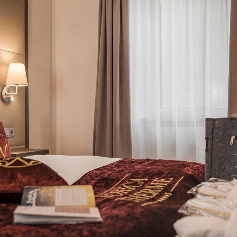 Hotel Norica - Thermenhotels Gastein mit dem Bademantel direkt in die Therme - Doppelzimmer mit Balkon - kostenfreier Eintritt in die Alpentherme - 2