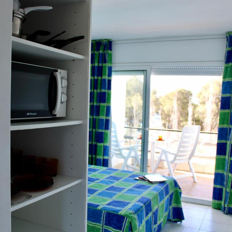 Apartamentos Cala Llevado - Estudio con vistas a la piscina - 1