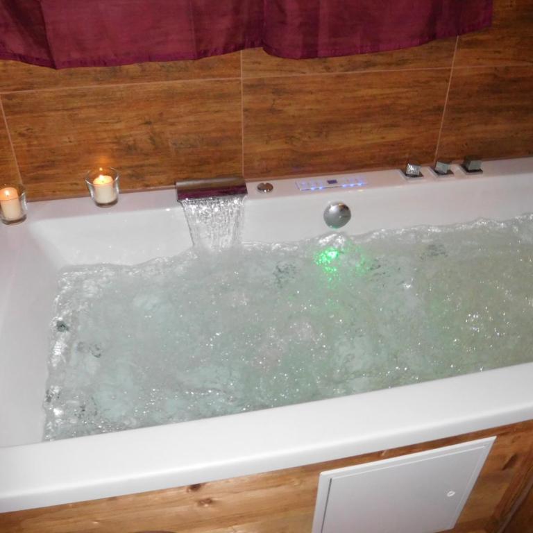 Wellnessoase mit Sauna und Whirlpool - Apartment mit 1 Schlafzimmer - 11