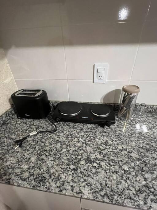 Departamento en zona residencial a 20 metros del parque general San Martín - Apartamento de 1 dormitorio - 22