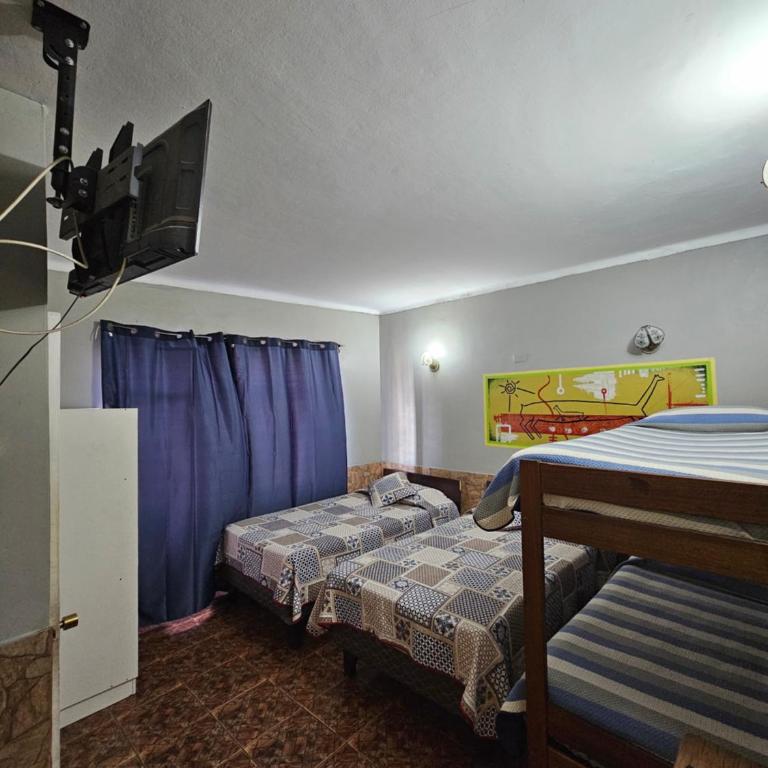 Hostal Copa Arica - Habitación Cuádruple con baño - 1