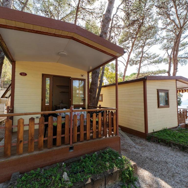 Camping Village Le Calanchiole - Bungalow con Vista Giardino - 1