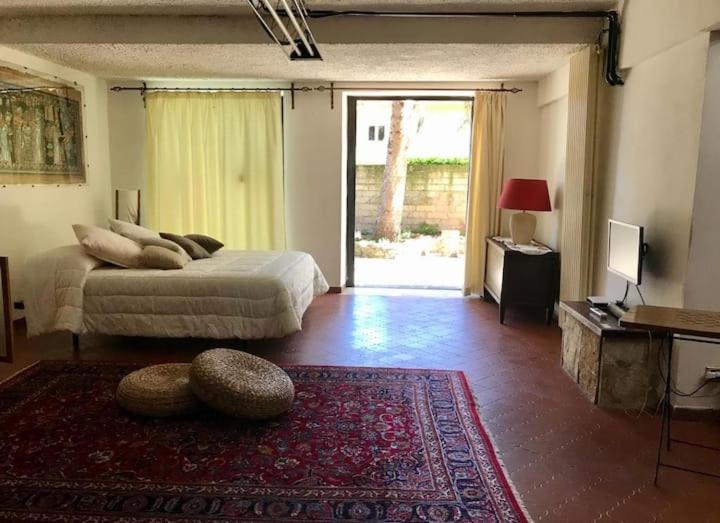 Loft con giardino in zona Appia Antica - One-Bedroom Apartment - 14