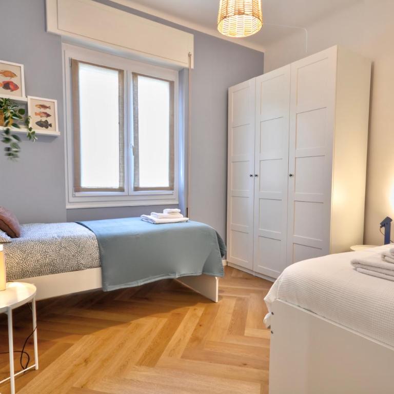 Luvì - Trilocale 4 posti letto, a 5 minuti a piedi dalla spiaggia - AC e WIFI - Appartamento con 2 Camere da Letto - 4