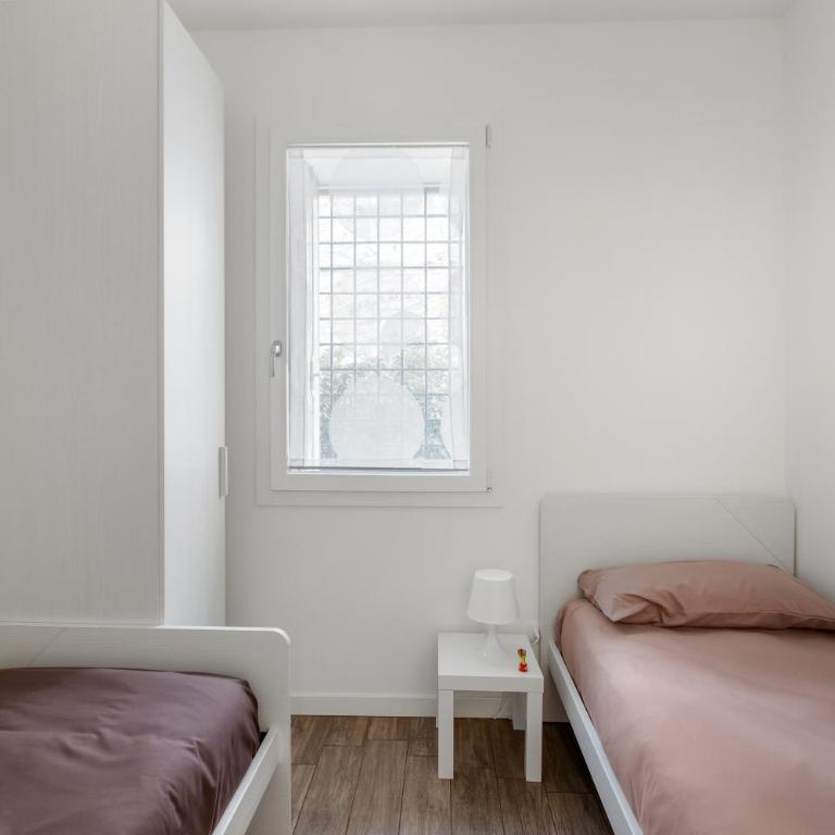 Civico 36 - Zona residenziale tranquilla - A 15 minuti a piedi dal Centro - Casa Guido - Appartamento con 2 Camere da Letto - 4