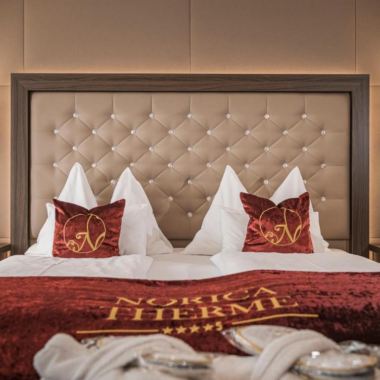 Hotel Norica - Thermenhotels Gastein mit dem Bademantel direkt in die Therme - Doppelzimmer mit Balkon - kostenfreier Eintritt in die Alpentherme - 1