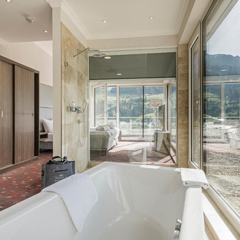 Hotel Norica - Thermenhotels Gastein mit dem Bademantel direkt in die Therme - Sky Suite - kostenfreier Zugang zur Alpentherme - 1