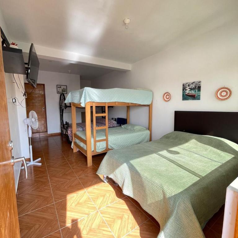 Hospedaje Pinos del Mar - Family Room with Garden View - 3