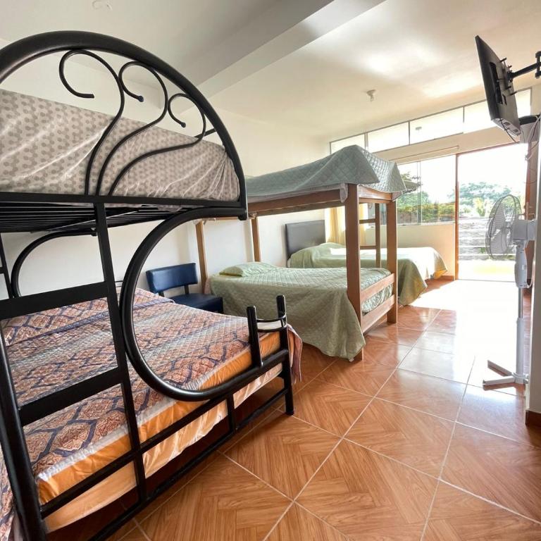 Hospedaje Pinos del Mar - Family Room with Garden View - 5