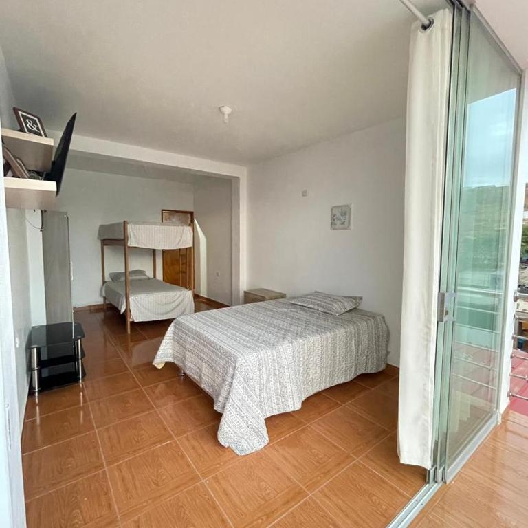 Hospedaje Pinos del Mar - Family Room with Side Sea View - 1