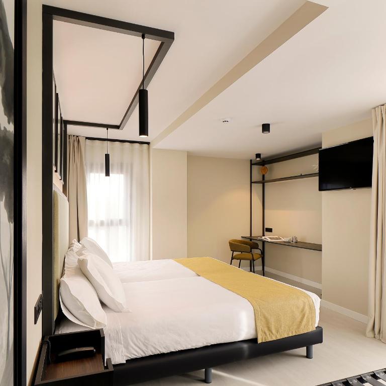 Nuvō Hotel Boutique - Habitación Doble Confort con sala de estar - 12