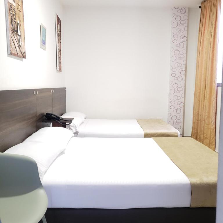 Hotel Suite Center Pereira - Habitación Triple - 1