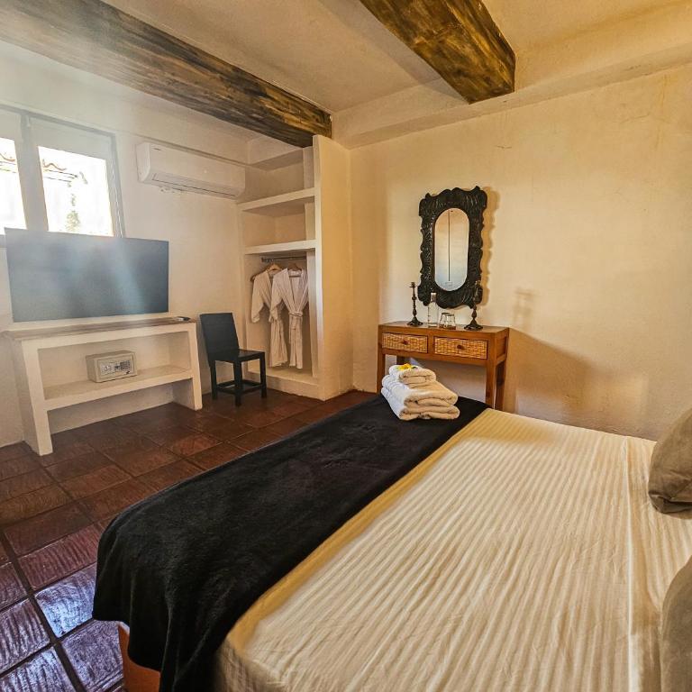 Casa Be Getsemaní - Habitación con cama extragrande y vistas al jardín - 29