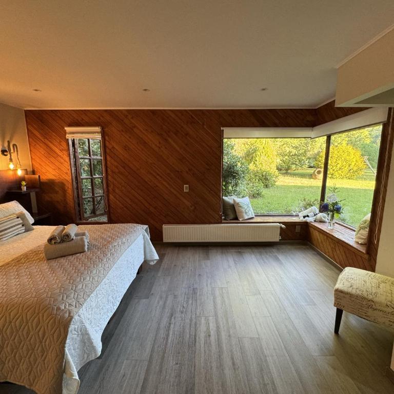 Magnolia Bed & Breakfast - Habitación con cama extragrande y vistas al jardín - 2