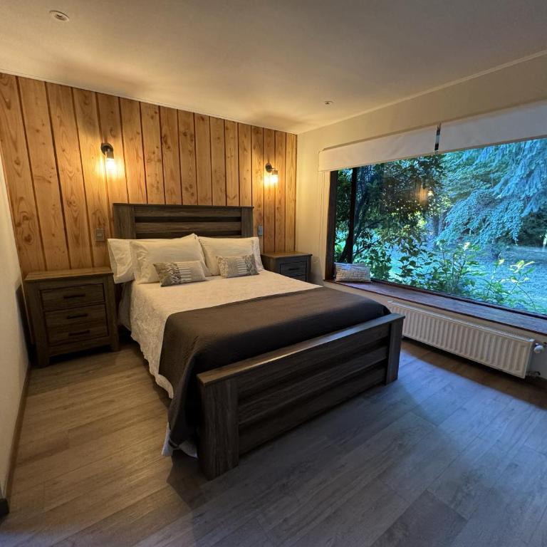 Magnolia Bed & Breakfast - Habitación con cama extragrande y vistas al jardín - 1