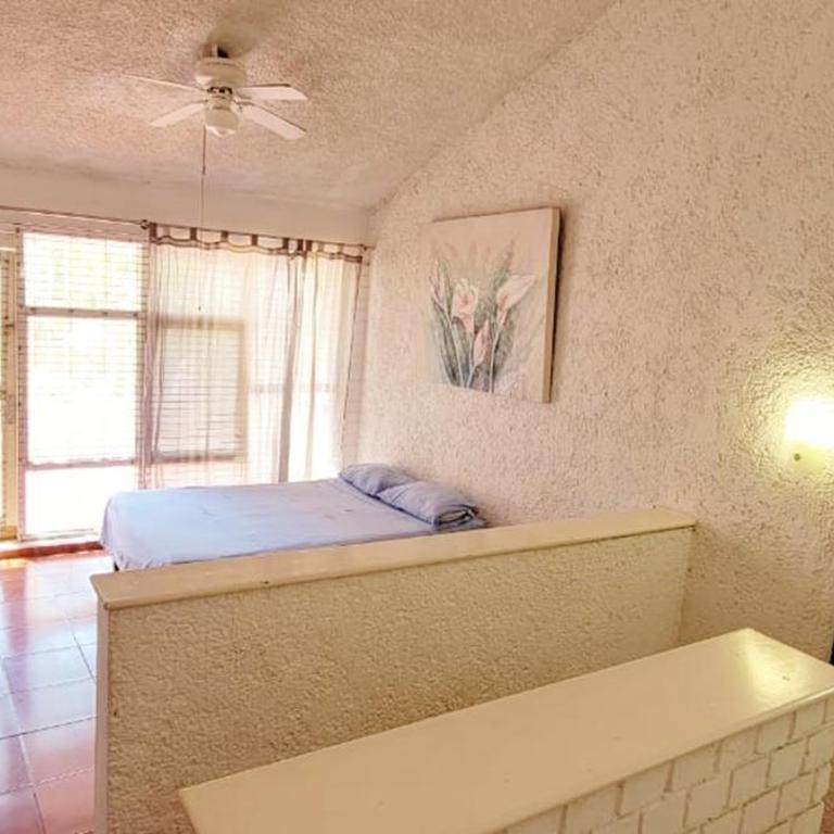 Departamento Familiar con Alberca Zona Dorada - Villa Serena - Three-Bedroom Apartment - 14