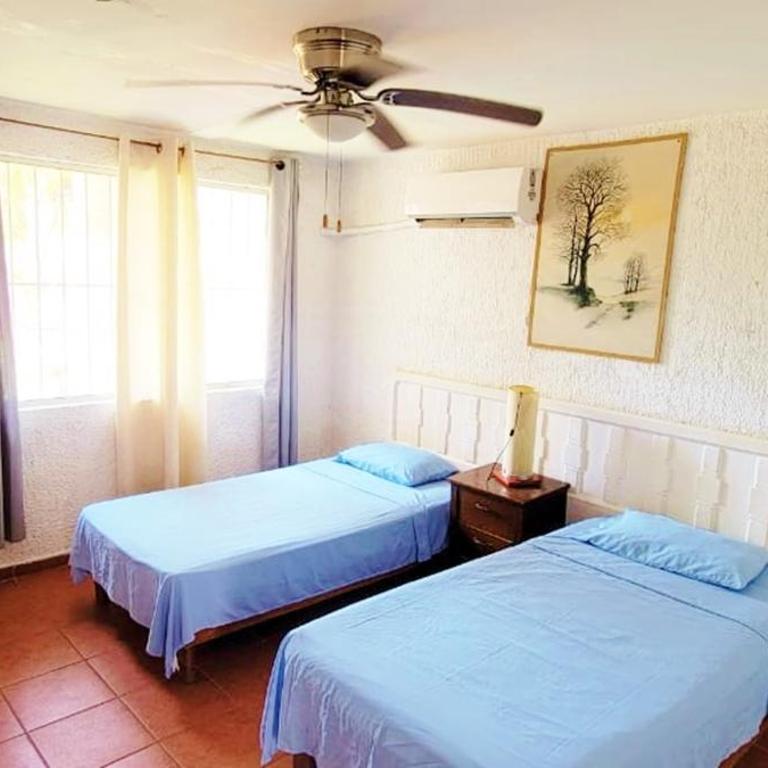 Departamento Familiar con Alberca Zona Dorada - Villa Serena - Three-Bedroom Apartment - 17