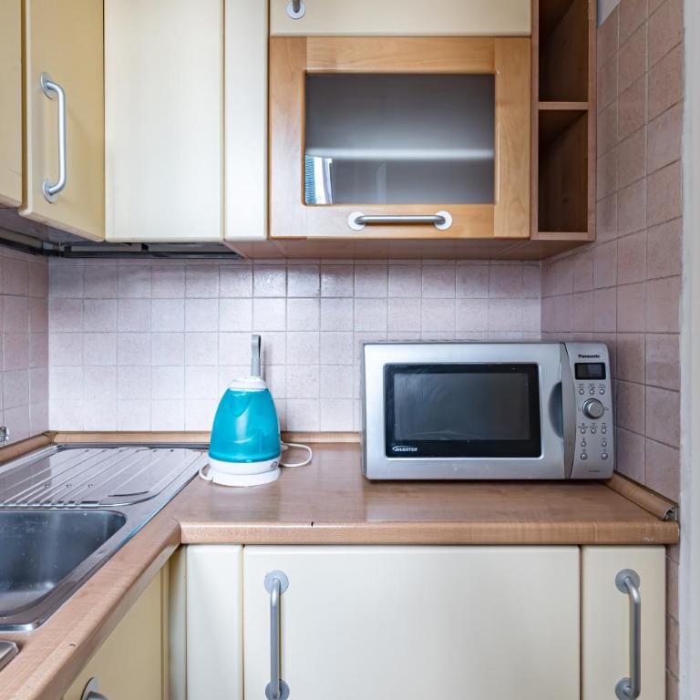 GuestHost - Urban Oasis - Central Apartment with Garden - Appartamento con 2 Camere da Letto - 11